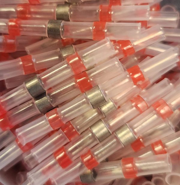 A pile of Sky High Car Audio Solder Seal Wire Connector Kit 340pc red and white plastic tubes.