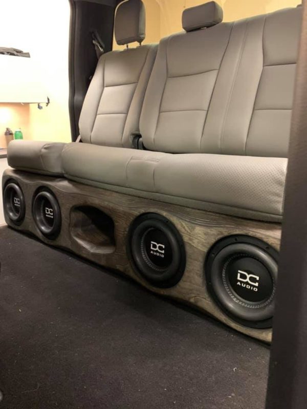 Gately Audio Perfect Fit Ford 4x8 Crewcab F150/250/350 in the back seat of a vehicle.