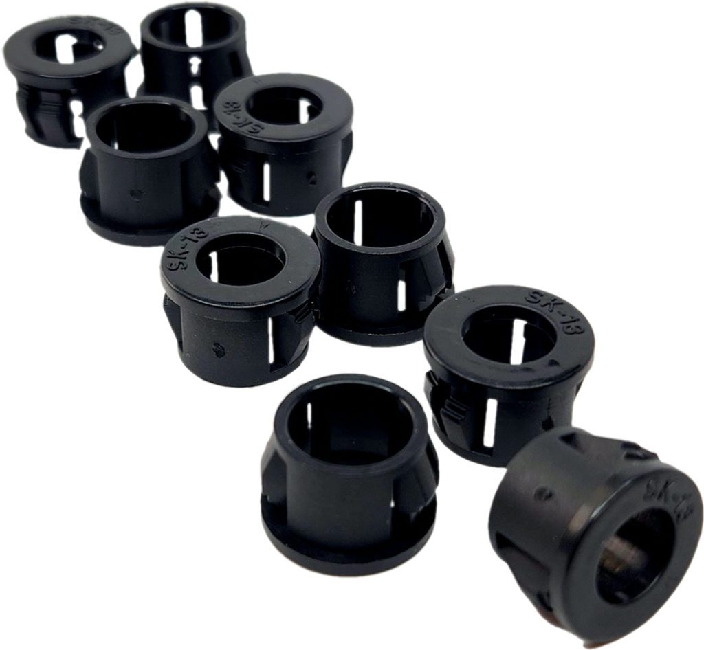 Six black Plastic Grommets 100 Pack for 8ga on a white background.