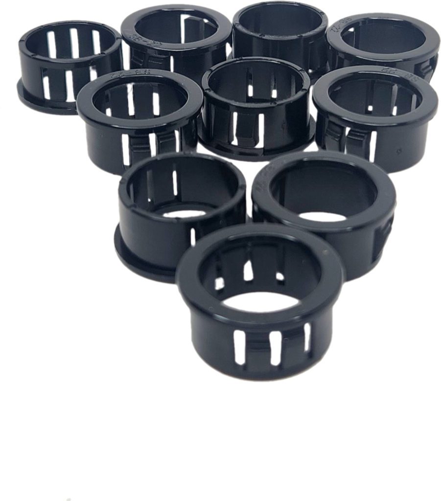 A set of Plastic Grommets 100 Pack for 1/0 on a white background.