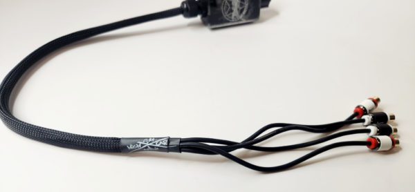 A black cable with the SHCA Premium Mid Printed Bass Knob Silver attached to it.