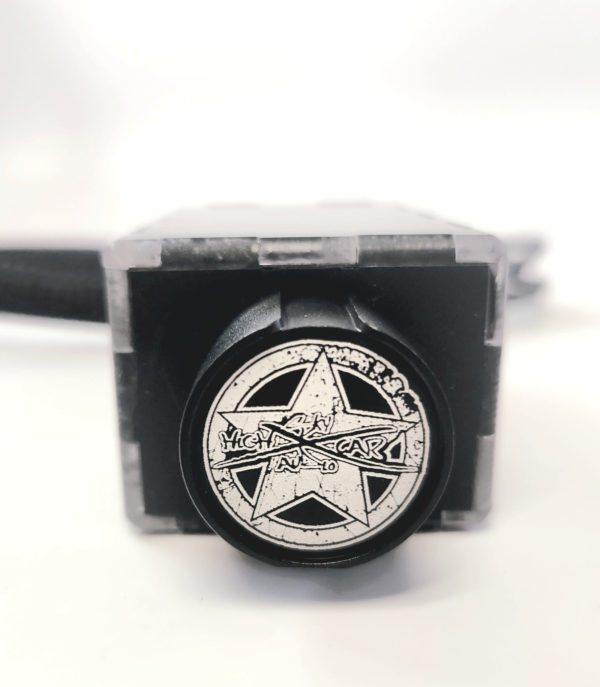 A SHCA Premium Mid Printed Bass Knob Silver with a star on it.