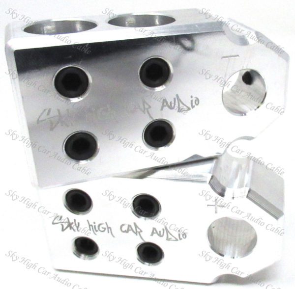 A pair of Sky High Car Audio SAE 4 1/0-4/0 XL Set Screw Battery Terminals with holes on them.