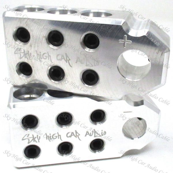A pair of Sky High Car Audio SAE 1/0 6 Input Set Screw Battery Terminals (Pair) with holes in them.