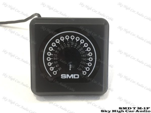 A black and white SMD TM-1 LED Amplifier Temperature Meter Fan Controller clock with the word md on it.
