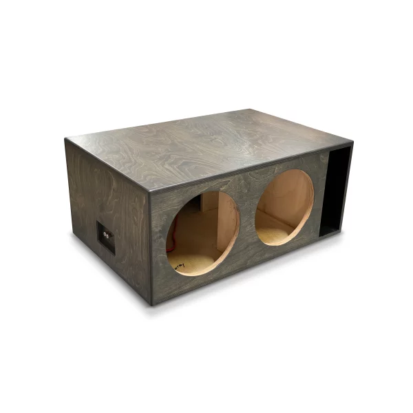 A Adire Audio Performance Series – Dual 12″ 4.0 Cf Net Ported Enclosure v2 featuring two Adire Audio subwoofers in a wooden box.
